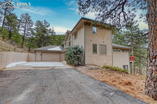 view of home's exterior featuring a garage