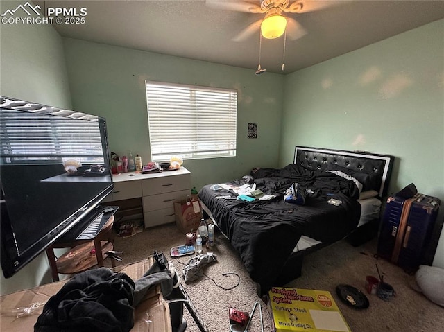 bedroom featuring ceiling fan and carpet flooring