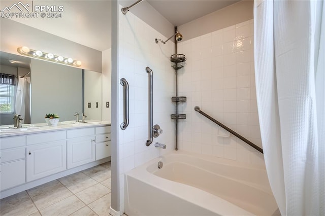 bathroom with tile patterned flooring, vanity, and shower / bath combo with shower curtain