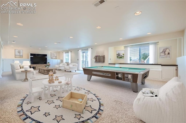 rec room featuring light colored carpet, a healthy amount of sunlight, and pool table