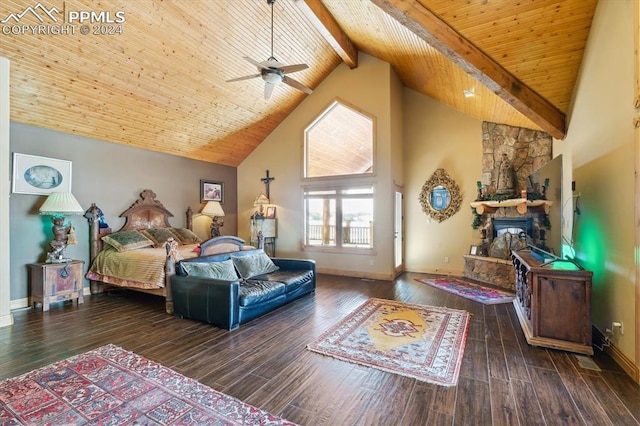 bedroom featuring ceiling fan, beam ceiling, high vaulted ceiling, a fireplace, and dark hardwood / wood-style floors