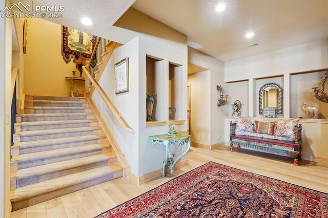 interior space with hardwood / wood-style flooring