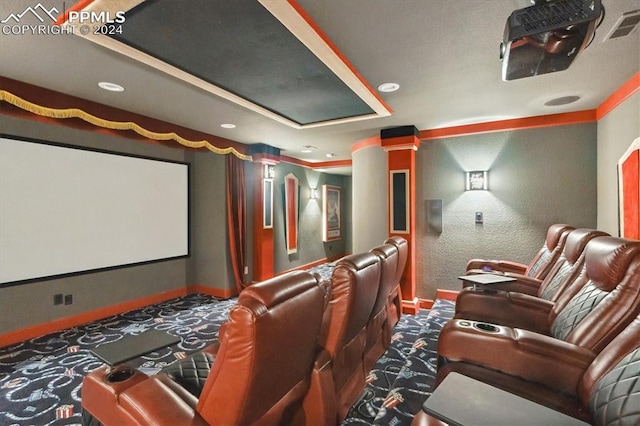 home theater room featuring carpet flooring and ornate columns