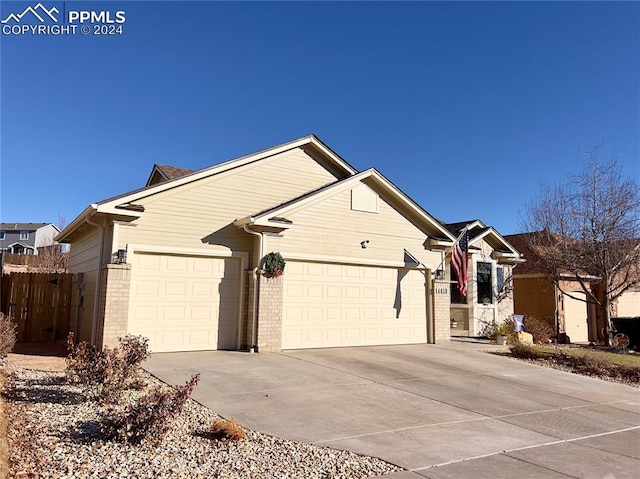 view of front of home with a garage