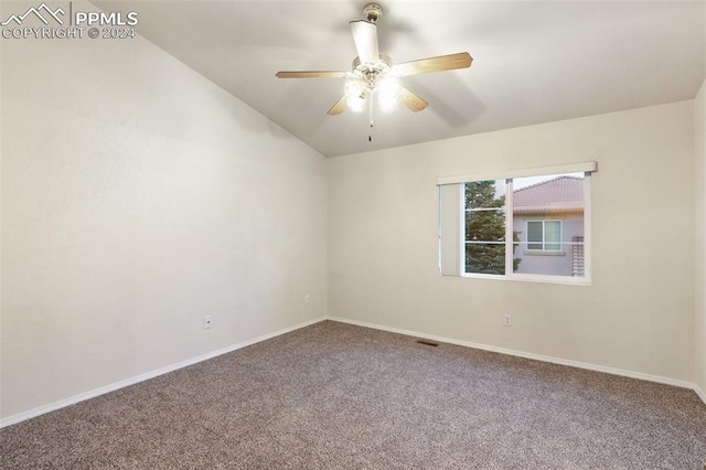 unfurnished room featuring carpet flooring, ceiling fan, and lofted ceiling