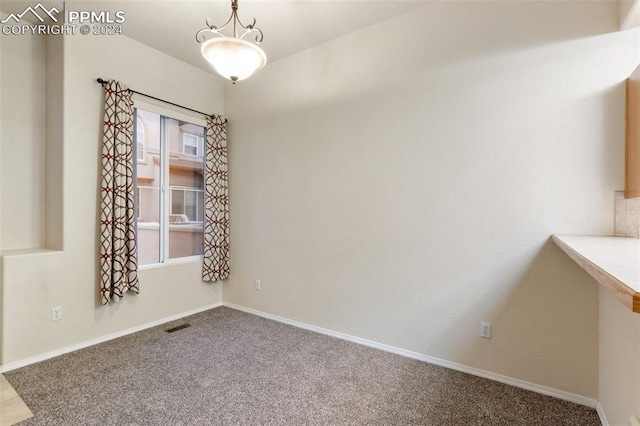 view of carpeted spare room