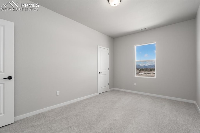 view of carpeted spare room