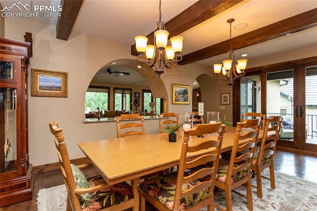 dining space with hardwood / wood-style flooring, ceiling fan with notable chandelier, and beam ceiling