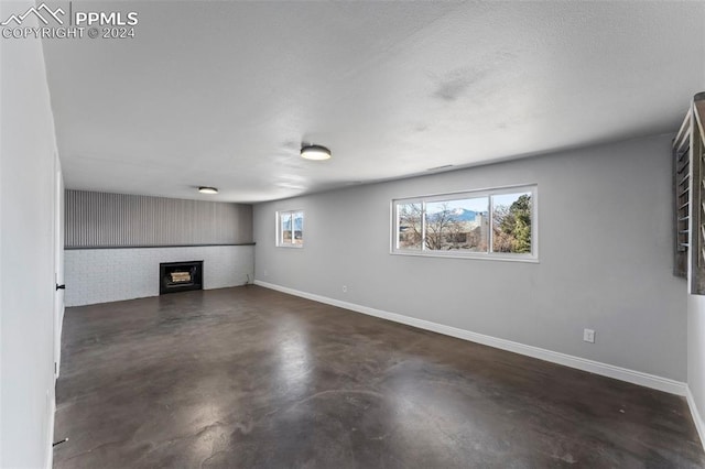 basement with a fireplace