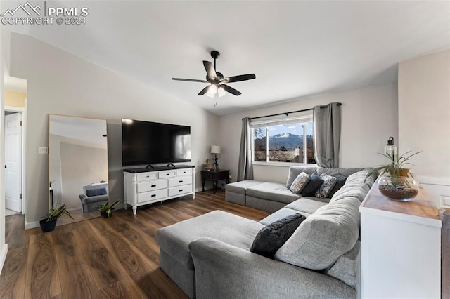 living room featuring ceiling fan, dark hardwood / wood-style flooring, and lofted ceiling