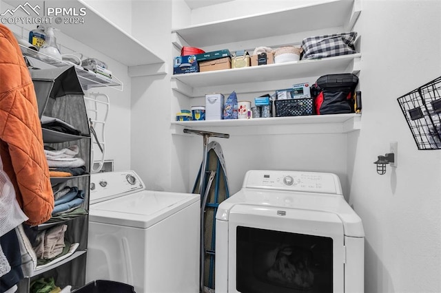 laundry room with washer and clothes dryer