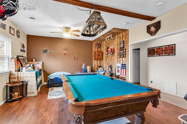 game room featuring beamed ceiling, wood-type flooring, ceiling fan, and pool table