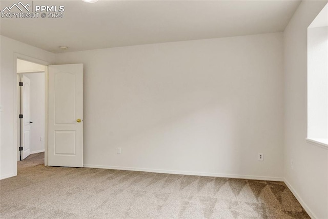 view of carpeted spare room