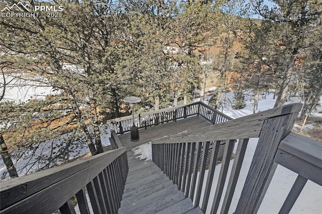 view of snow covered deck