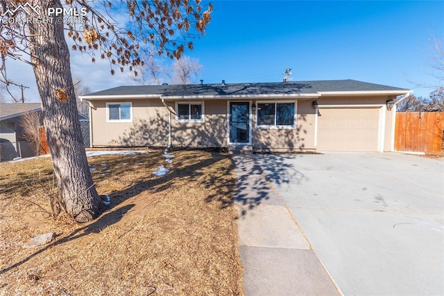 single story home featuring a garage