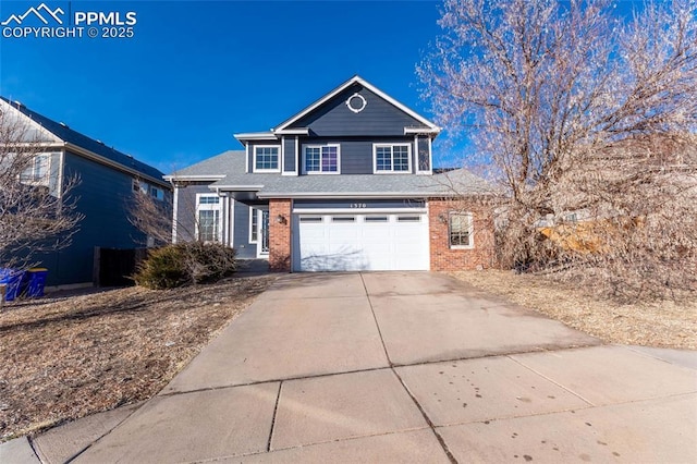 front of property with a garage