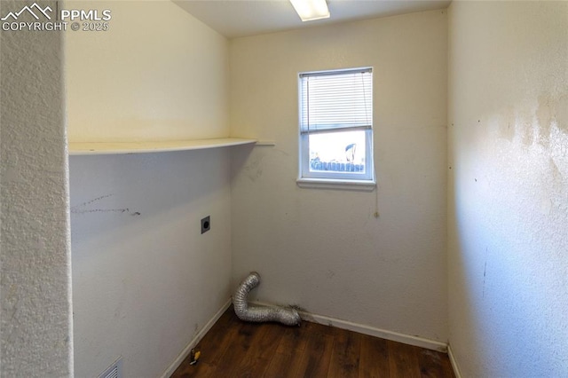 laundry room with hookup for an electric dryer and dark hardwood / wood-style flooring