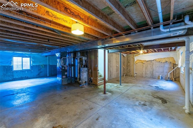 basement featuring gas water heater