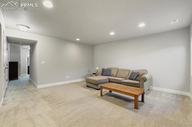 living room featuring light carpet