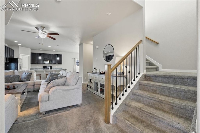 living room featuring ceiling fan