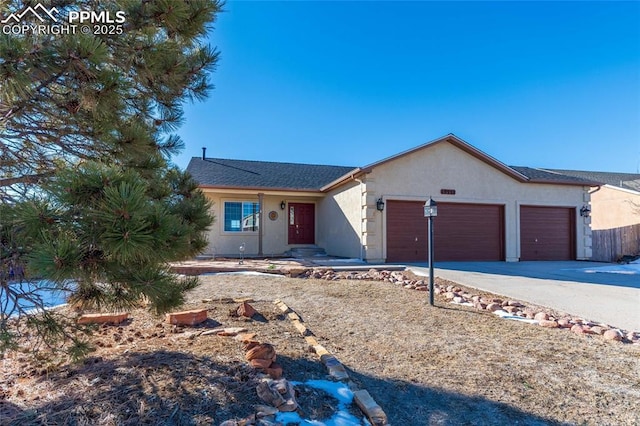 single story home with a garage