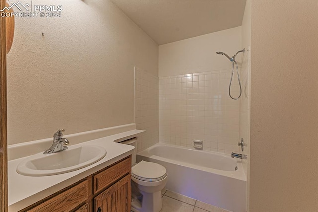 full bathroom with tile patterned floors, vanity, shower / bath combination, and toilet