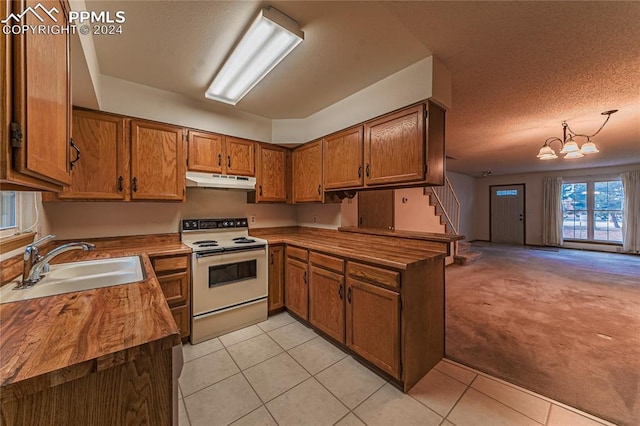 kitchen featuring sink, an inviting chandelier, wooden counters, white electric stove, and light carpet