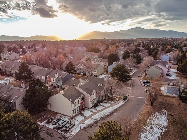 aerial view at dusk with a mountain view