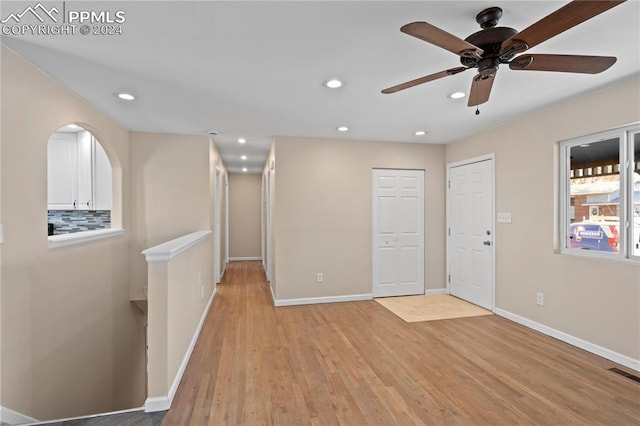 unfurnished room with recessed lighting, visible vents, baseboards, and light wood-style floors