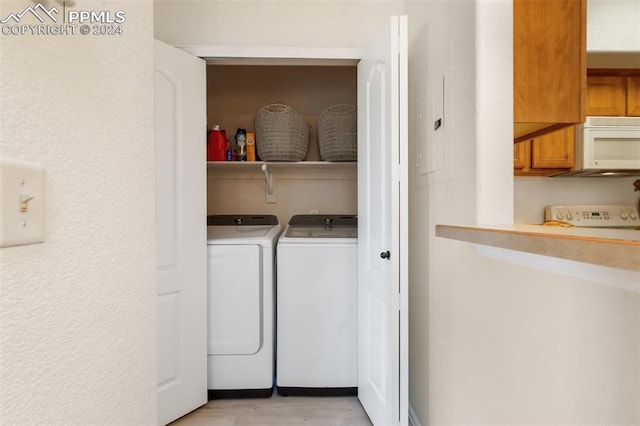 laundry area featuring separate washer and dryer