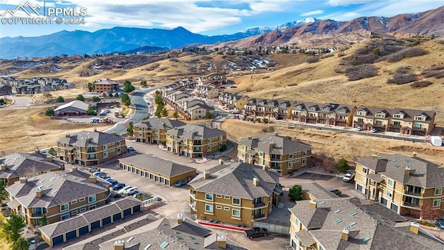 drone / aerial view featuring a mountain view