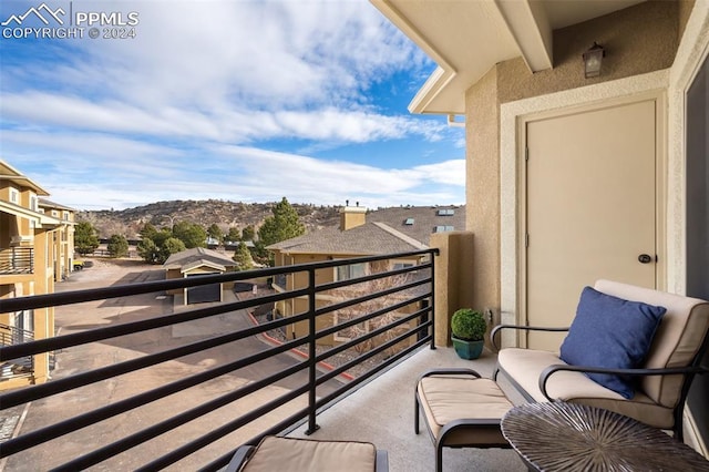 balcony featuring a mountain view