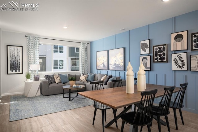 dining room featuring light hardwood / wood-style floors