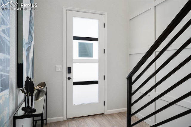 entrance foyer with light hardwood / wood-style floors