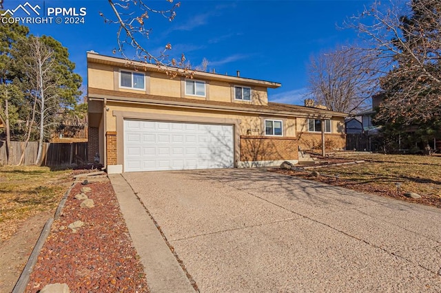 view of front of property featuring a garage