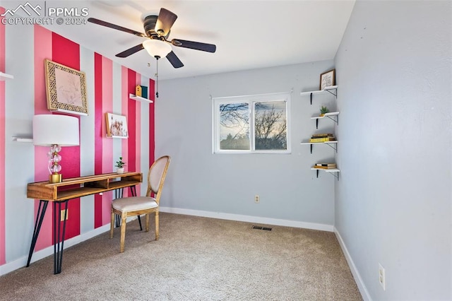 carpeted office with ceiling fan