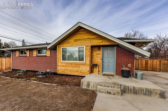 view of front of home with a patio