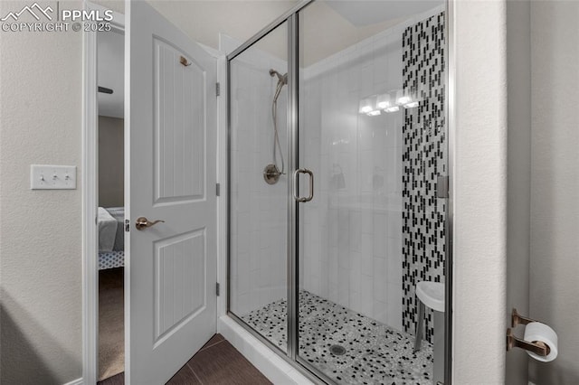 bathroom with an enclosed shower