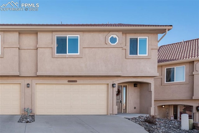 view of front of home with a garage