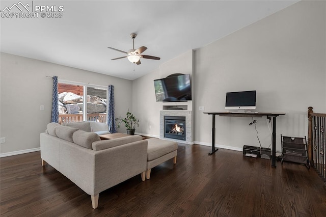 living room featuring a fireplace, dark hardwood / wood-style flooring, ceiling fan, and lofted ceiling