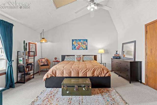 carpeted bedroom with ceiling fan and lofted ceiling