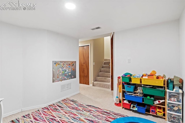 playroom featuring carpet