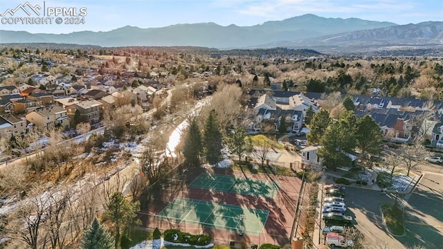 birds eye view of property featuring a mountain view