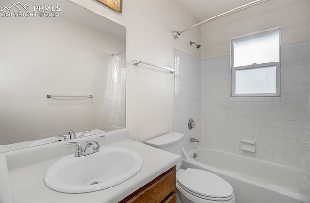 full bathroom featuring vanity, toilet, and shower / bath combo with shower curtain