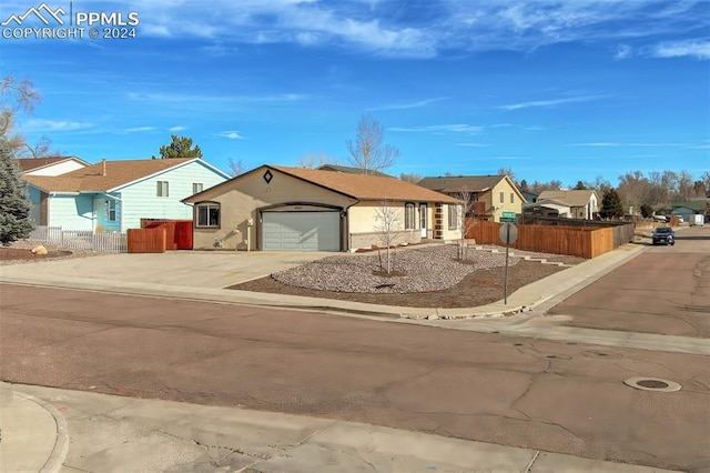 single story home with a garage