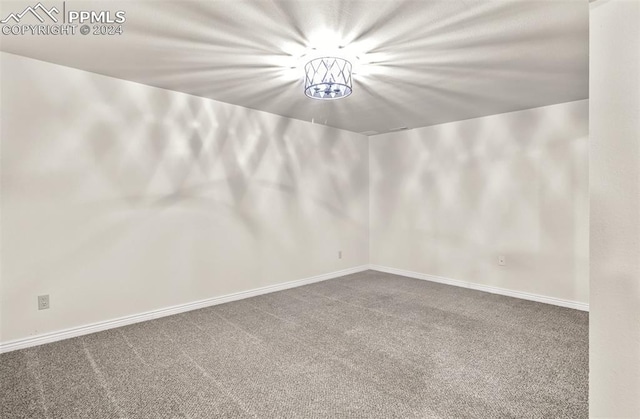 unfurnished room with carpet