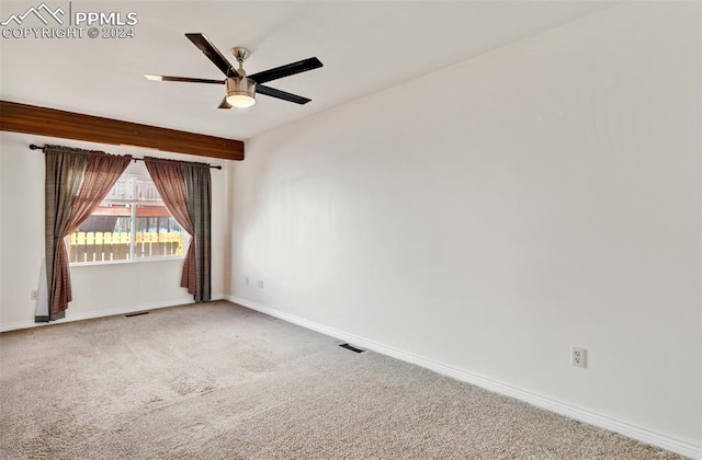 carpeted empty room with ceiling fan