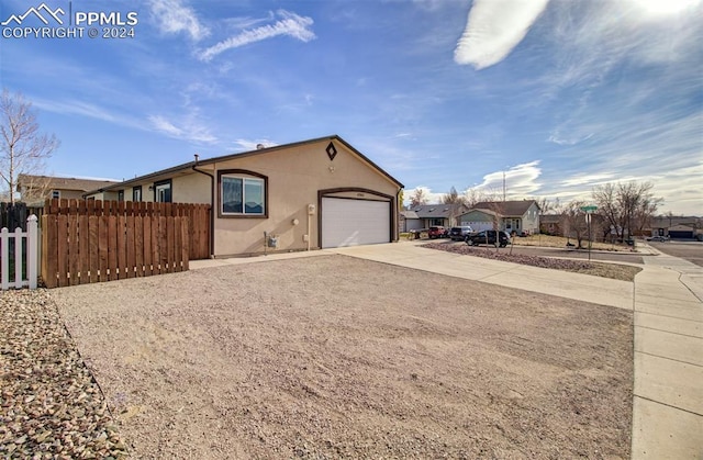 view of home's exterior featuring a garage