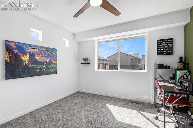 office area with carpet floors and ceiling fan