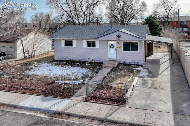 view of front of house with a carport